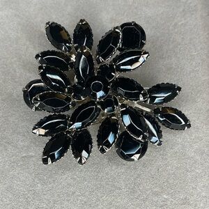 Vintage black glass brooch